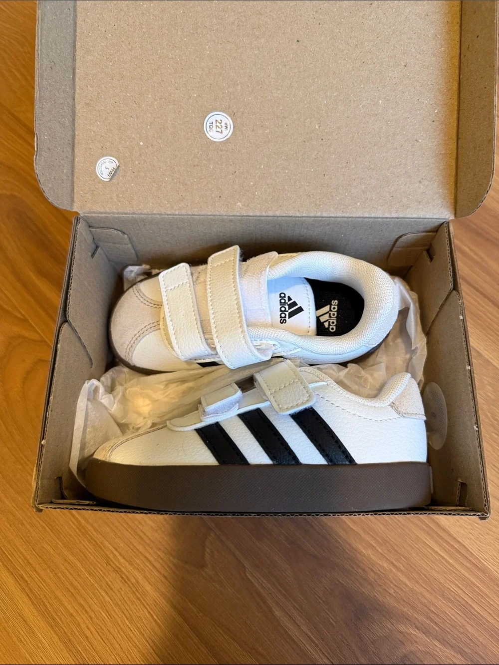 adidas Kids White Sneakers with Black Stripes and Brown Sole